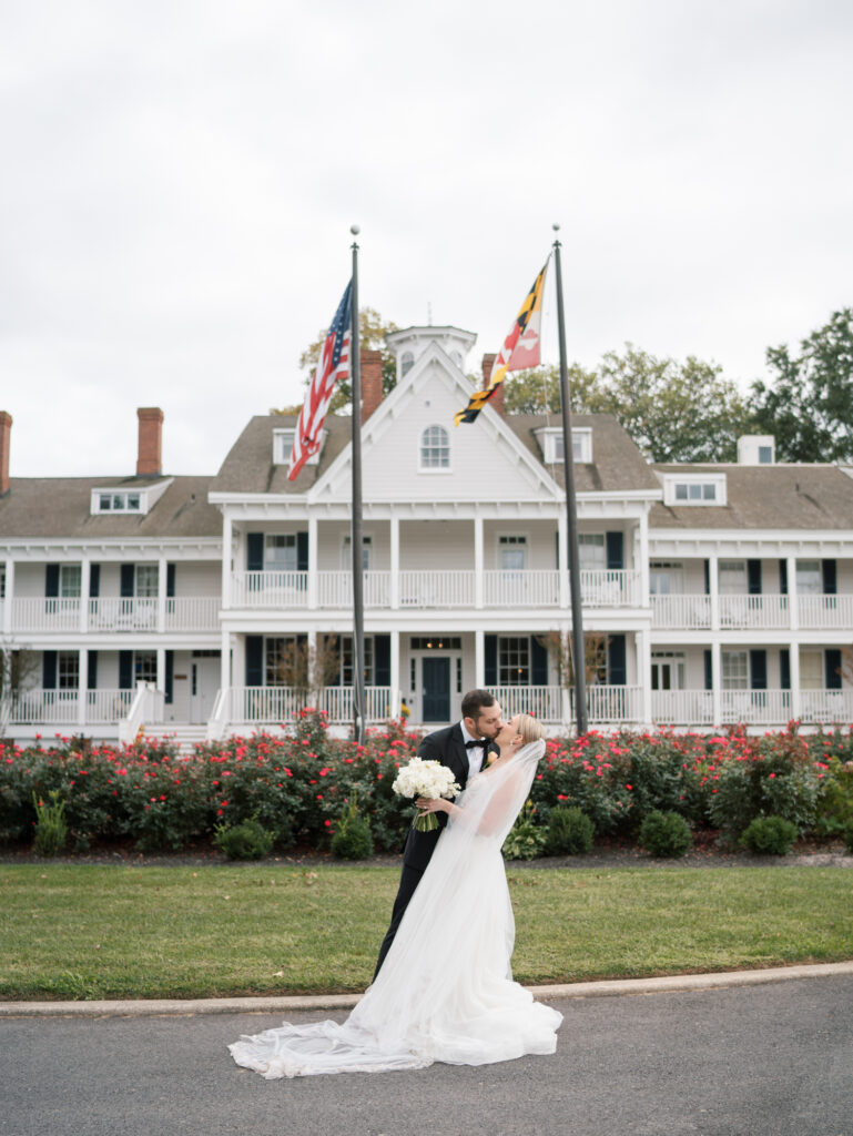 kent island resort bride and groom photos in front of venue